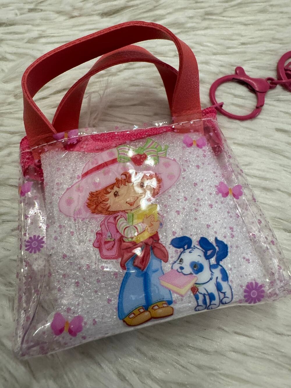Strawberry Shortcake clear mini purse zipper with pink handles and keychain